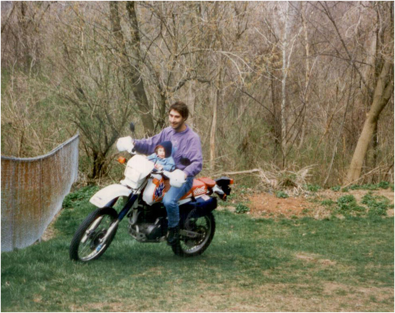 My father and sister enjoying a brief backyard ride