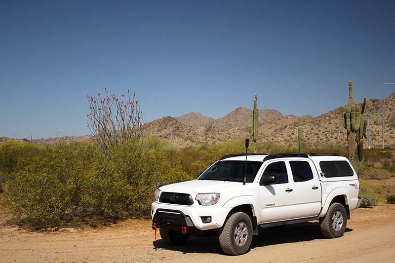 White Toyota Tacoma on Offroad Desert Trail